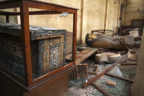 Damaged antiquities and other objects at Egypt's Malawi National Museum (Roger Anis / El Shorouk / Associated Press)