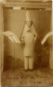 Hugo Ball in 'cubist costume' reciting his poem 'Elefantenkarawane' at the Cabaret Voltaire, 23 June 1916. Hugo Ball/Emmy Hennings Estate, Robert-Walser Archiv, Zürich (image courtesy DADA Companion)