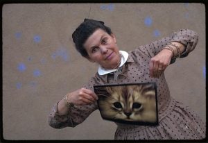 Portrait of Ray Eames holding a photograph of a cat. Photo by Office of Charles and Ray Eames, 1970. //hdl.loc.gov/loc.pnp/ppmsca.38223